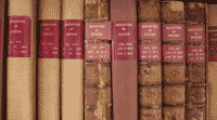 Image shows volumes of the Register of Deeds on a shelf. Crown Copyright: National Records of Scotland. 